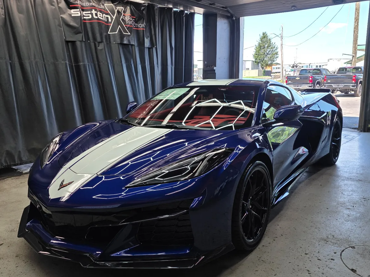 A C8 Corvette in our paint-protection bay — ceramic coating for owners who want to keep that factory finish looking new.