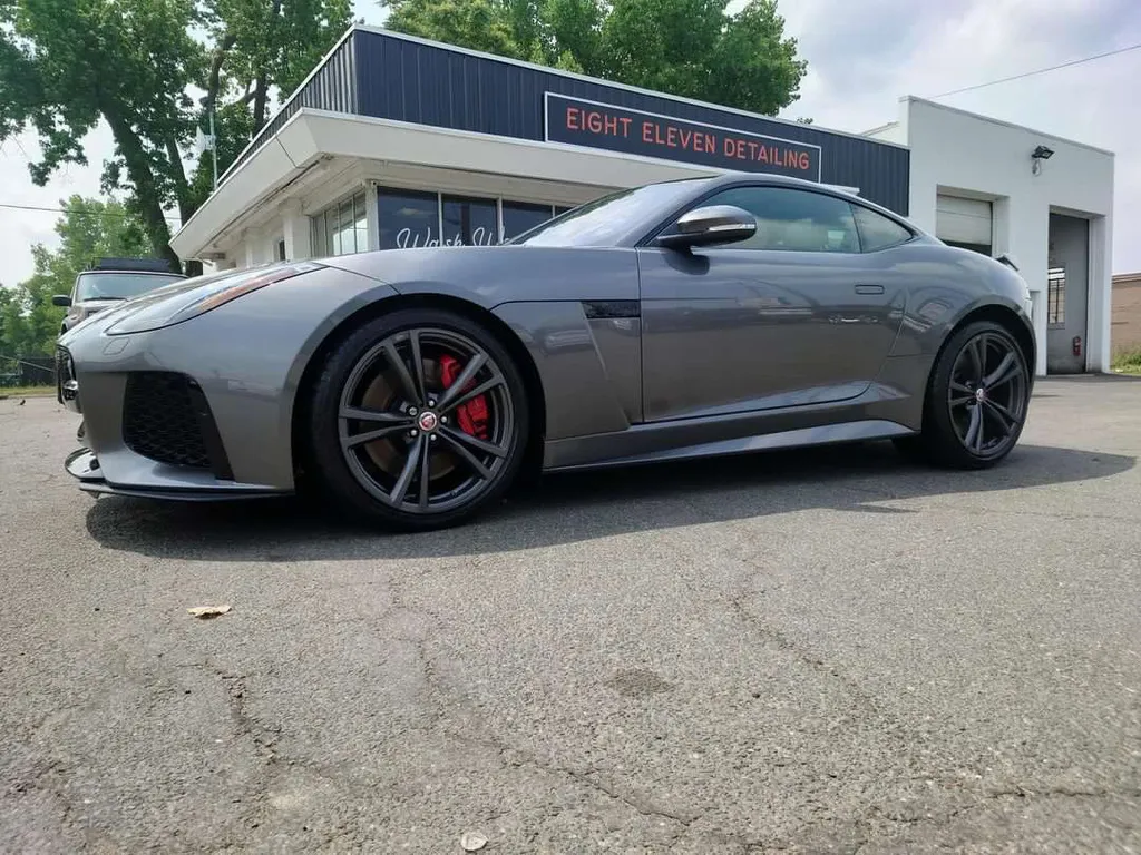 A Jaguar F-TYPE outside our bay after a Full Detail — hand wash, machine polish, and paint sealant, finished right in West Springfield.