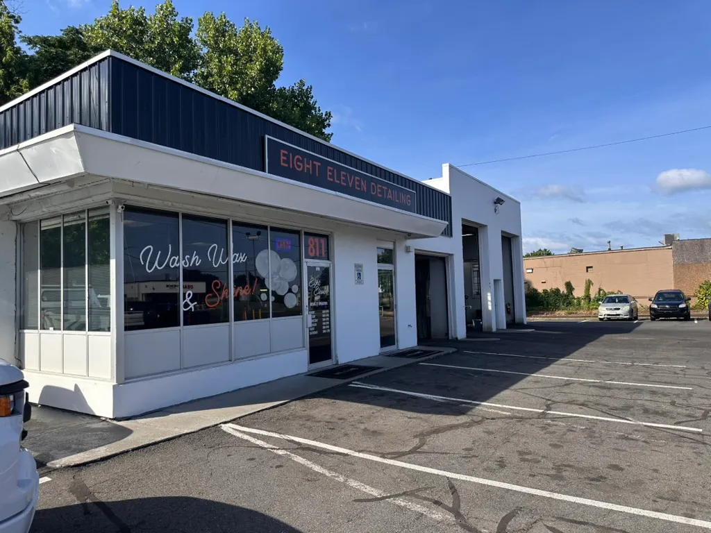 The 811 Detailing storefront at 811 Memorial Avenue in West Springfield, MA — the retro sign-topper look, right off the real building.
